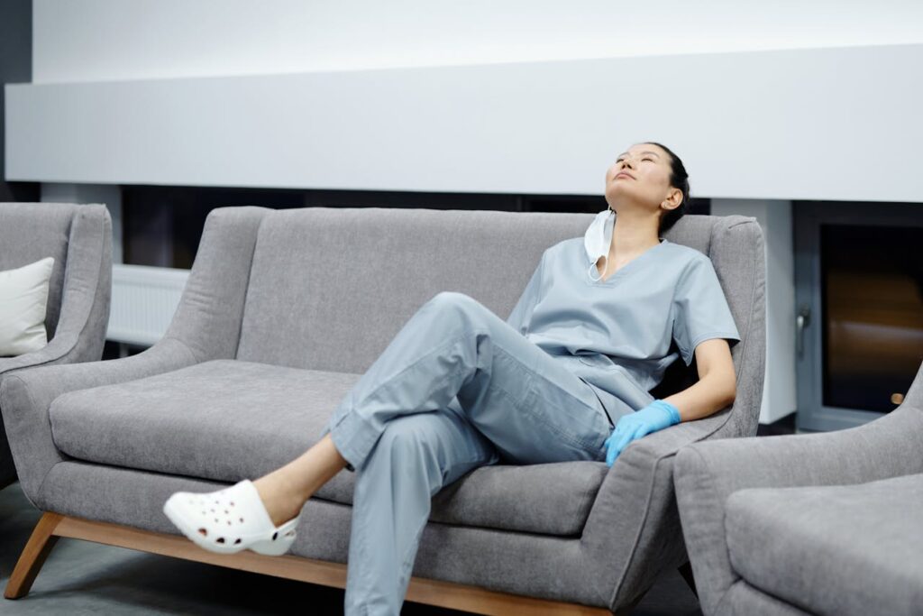 tired female nurse sitting taking a break 