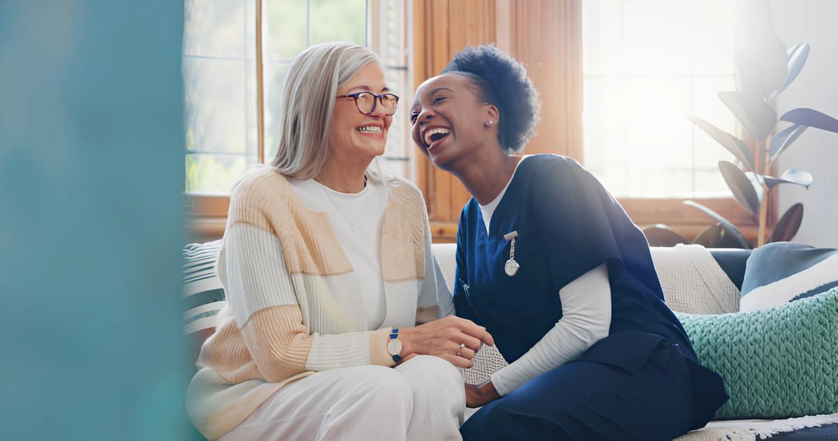 Care Plan Inc caregiver sharing a warm moment with clients at home